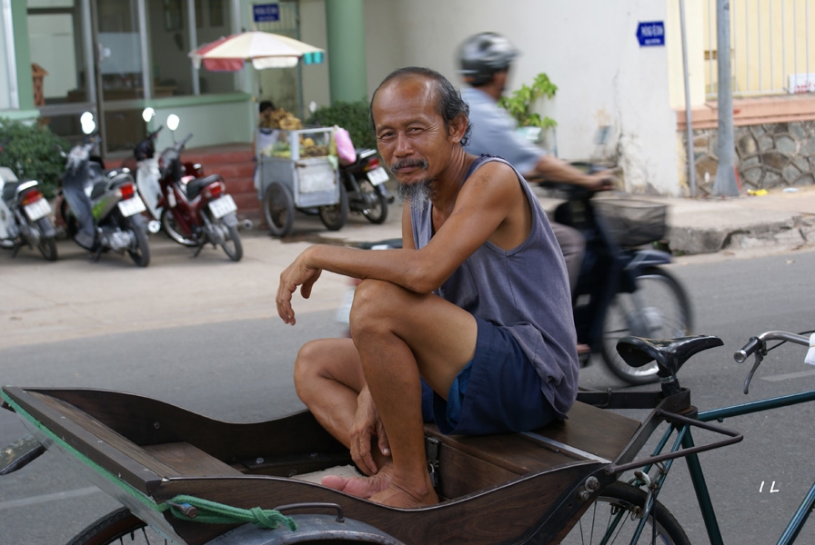 Sympathique-proprietaire-dun-cyclo-pousse-a-CAN-THO